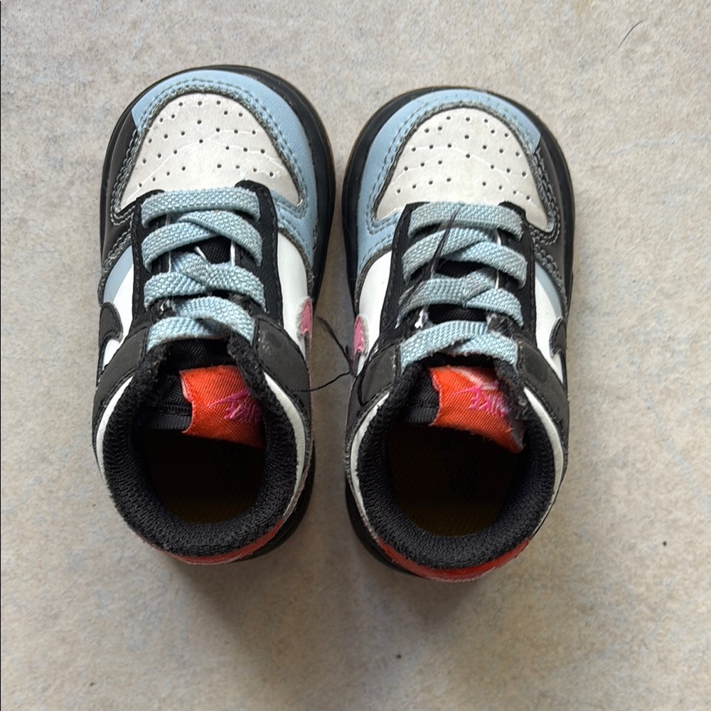 Nike Black and Blue Sneakers with Sporty Design